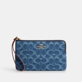 Grosse Handgelenktasche mit Reissverschluss an der Ecke aus charakteristischem Denim