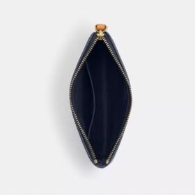 Handgelenktasche mit Reissverschluss an der Ecke aus charakteristischem Denim