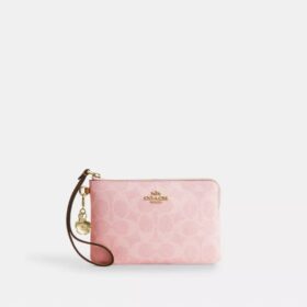 Handgelenktasche mit Reissverschluss an der Ecke aus Signature Canvas mit Anhängern