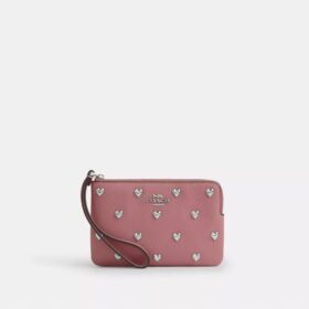 Handgelenktasche mit Reissverschluss an der Ecke und Herznieten