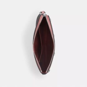 Handgelenktasche mit Reissverschluss an der Ecke und Herznieten