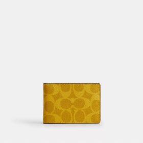 Kompakte Geldbörse aus Signature Canvas