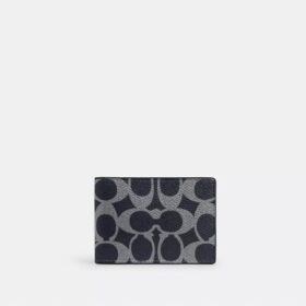 Kompakte Geldbörse aus Signature Canvas
