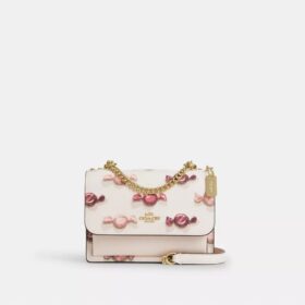 Mini-Klare-Umhängetasche mit Candy-Print