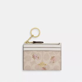 Mini Skinny ID-Etui aus Signature Canvas mit Blumenmuster