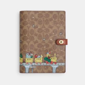 Notizbuch aus Signature Canvas mit Weihnachtszug-Motiv