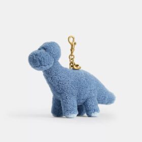Rexy 10. Geburtstag – «Buddy Dinosaur»-Taschenanhänger aus Lammfell