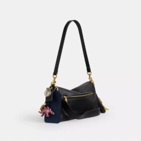 Rexy 10. Geburtstag Tabby-Schultertasche 26 mit Anhängern